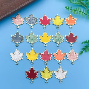 Colorful maple leaf enamel charms for DIY jewelry making with gold plated edges