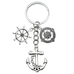 Antique silver nautical keychain featuring compass, anchor and ship wheel pendants
