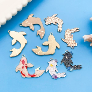 Set of colorful enamel koi fish charms for DIY jewelry making with gold finish