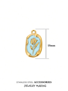 Detail of 18mm stainless steel gold tulip pendant with light blue enamel finish