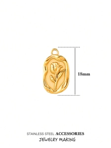 Detail of 18mm gold tulip flower engraved pendant charm made of durable stainless steel