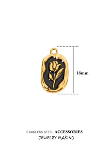 Detailed 18mm stainless steel oval pendant with golden tulip on black enamel inlay