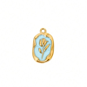 Golden oval pendant with blue enamel and tulip relief on white background