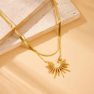 Collier double rang vintage plaqué or 18k avec pendentif soleil et maille serpent