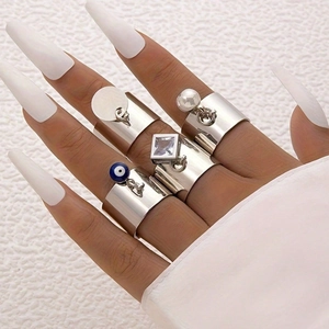 Ensemble de 4 bagues vintage en acier inoxydable avec oeil bleu et breloque zircon