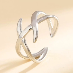 Minimalist silver stainless steel open ring with intertwined double line geometric design