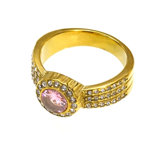 Luxurious gold ring featuring a pink round-cut halo stone and pavé set side bands