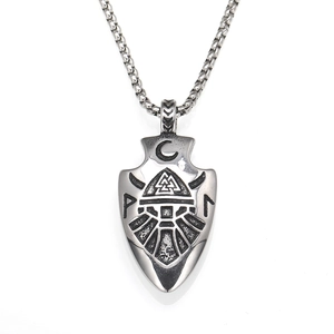 Close-up of vintage stainless steel Viking arrowhead pendant with Valknut symbol