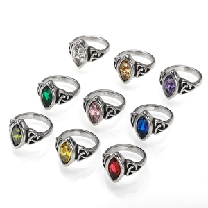 Retro titanium steel rings featuring marquise cut colorful gemstones and Celtic knot patterns
