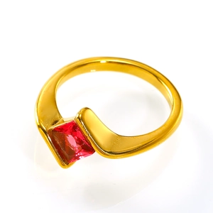 Detail of 18K gold stainless steel ring with a square-cut red zircon in semi-bezel setting