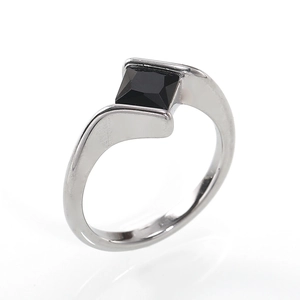 Minimalist silver bypass ring featuring a square cut black gemstone on a polished band