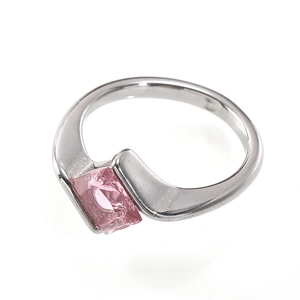 Detailed close-up of a silver ring with a rectangular pink zircon stone in 45-degree view