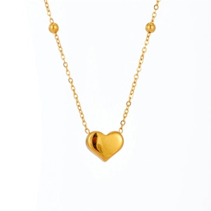 Collier à pendentif cœur doré poli avec accents de perles dorées sur une chaîne fine