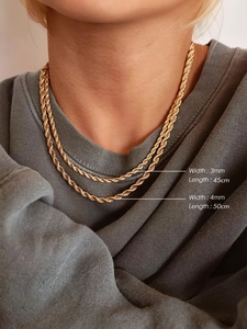 Model wearing golden stainless steel rope chains in 3mm and 4mm width variants