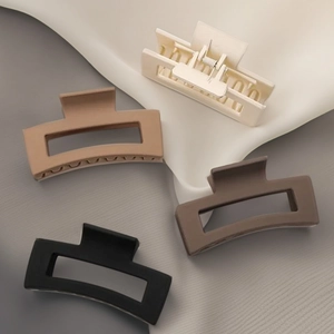 Set of 4 matte geometric claw clips in earth tones for thick hair styling