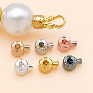 Macro view of 6-color metal round pearl connector pegs for DIY jewelry making accessories