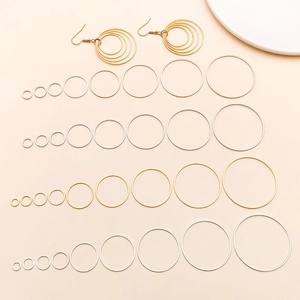 Assorted gold and silver geometric circular earring components for DIY jewelry making