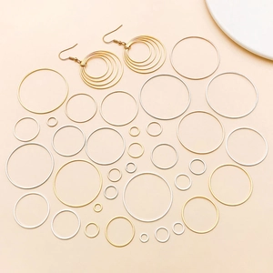 Detailed set of varied size copper geometric round rings for DIY jewelry and earring making