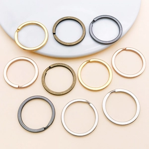 Flat round iron keyrings in multiple electroplated colors for DIY crafts and accessories