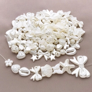 Mix di perline ABS color crema a forma di cuore e fiori per creazione gioielli DIY