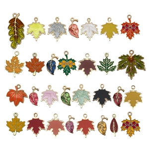 DIY autumn leaf enamel charms set in golden alloy for jewelry making projects