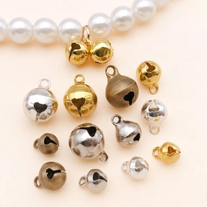 Bastelglocken Set in Gold Silber und Bronze mit herzförmigen Ausschnitten für DIY