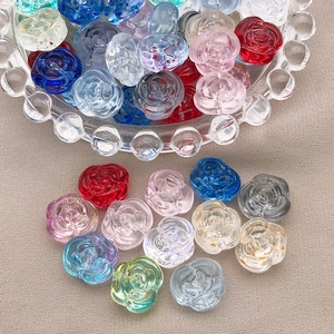 Macro shot of colorful glass camellia flower beads for DIY handmade jewelry crafts