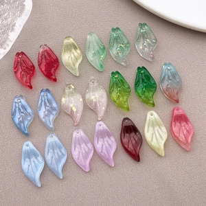 Macro shot of 20x9mm colorful glass leaf pendants with gold foil for DIY jewelry making
