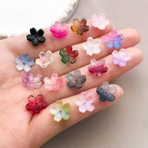 Detailed macro view of 10mm gradient glass cherry blossom beads for DIY jewelry making