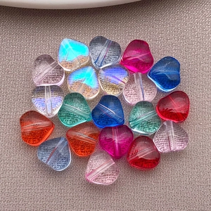 Close-up of 6mm candy-colored glass heart beads with frosted texture for DIY jewelry
