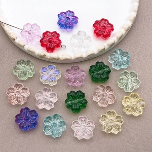 Macro detail of mixed color 13mm cherry blossom glass beads for DIY jewelry making