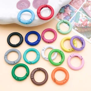 Macro shot of colorful 20mm zinc alloy spring O-rings for bag accessories and DIY projects
