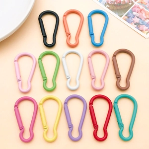 Close-up of colorful 47x24mm aluminum pear-shaped carabiners for DIY keychain accessories