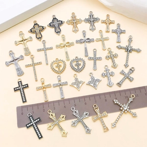 Assorted alloy cross and heart charms with crystals in gold and silver finishes