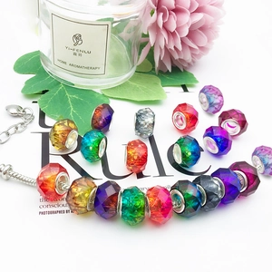 Colorful faceted resin charms on silver snake chain bracelet for DIY jewelry making