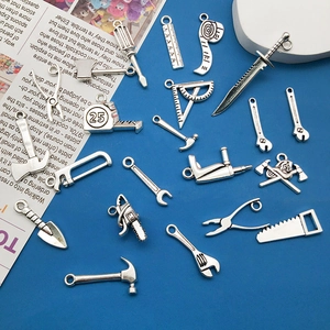 Vintage silver alloy hardware tool pendants set with hammer, saw and ruler tools