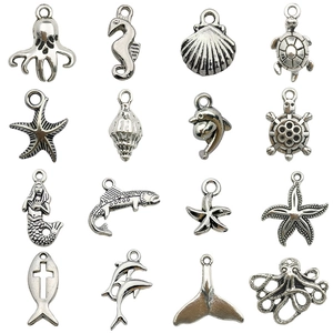 Set of 16 vintage silver ocean animal charms featuring starfish and seahorse for DIY jewelry