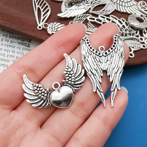Ailes de plumes argent antique et breloques ange cœur pour bijoux DIY