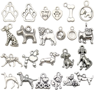 20pcs set of silver alloy dog charms featuring various breeds, paw prints and bone shapes