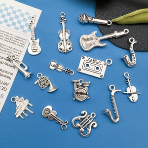 Vintage silver alloy musical instrument charms including guitar and violin for DIY jewelry