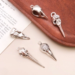 Set of 5 vintage silver skull bird head pendants in gothic punk style for DIY jewelry