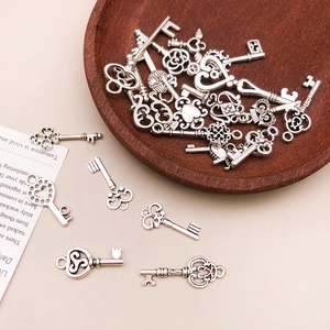 Antique silver clover heart key charms for DIY jewelry making and handmade crafts