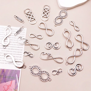 Variety of antique silver infinity charms and connectors for DIY bracelet jewelry making