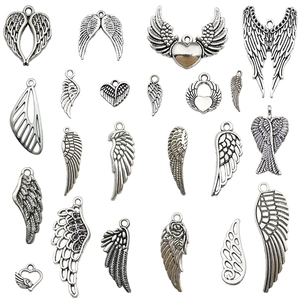 Assorted antique silver alloy angel wing pendants with detailed feather textures