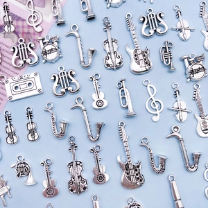 Antique silver musical instrument pendants including guitar and violin for DIY jewelry