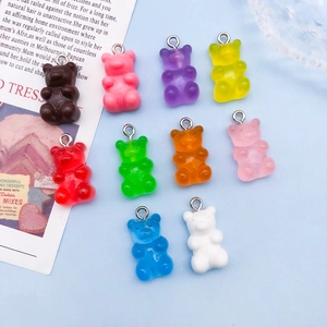 Ten candy-colored acrylic gummy bear pendants with metal rings for DIY jewelry projects