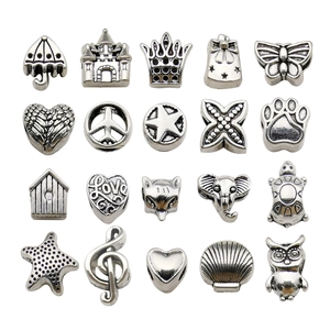 Collection of 20 vintage silver alloy charms featuring stars, hearts and animal designs
