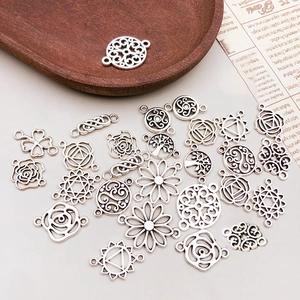 Vintage silver alloy flower charms for DIY jewelry making with rose and mandala patterns