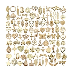 Set van 100 diverse gouden legering hangers met hartjes schelpen en sterren voor DIY sieraden