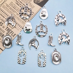 Antique silver cowboy charms set featuring boots, hats, and horseshoes for DIY jewelry